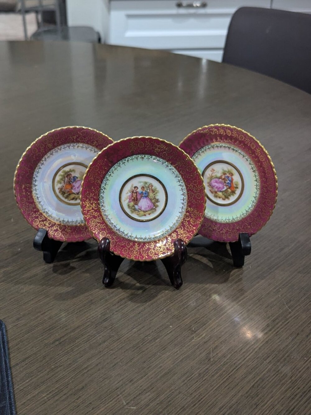 Lot 3 Limoges 4.5" Saucers: Burgundy & Gold , with Fragonard "Courting Couple"